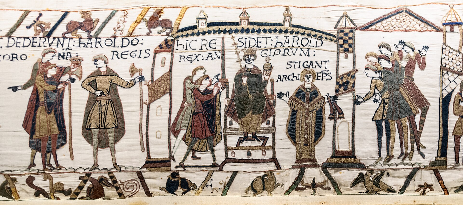A scene from the original Bayeux Tapestry: figures in coloured wool thread on plain linen cloth